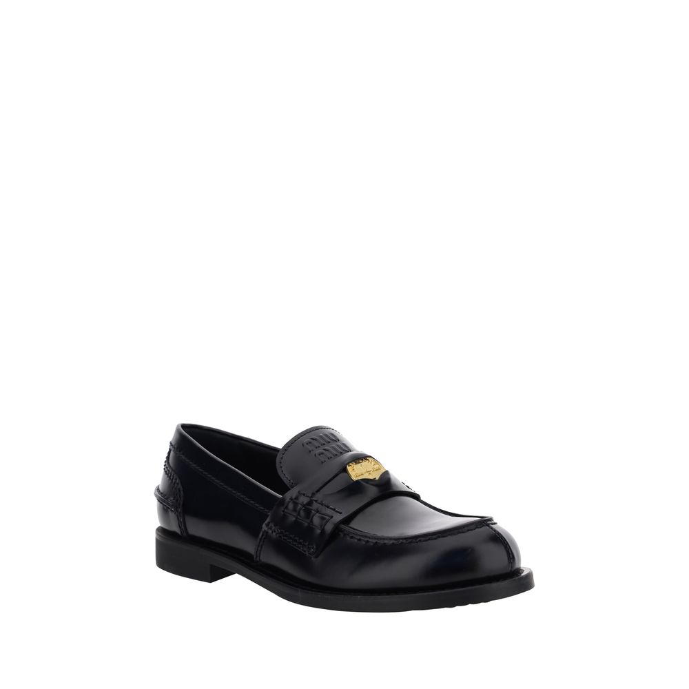 Miu Miu Black Rubber Slip-On Loafers