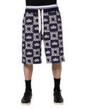 Dolce & Gabbana Bermuda de hombre de lona azul con logo DG estampado