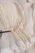 Blusa de cuello tipo ascot de seda y algodón blanco de Dolce & Gabbana