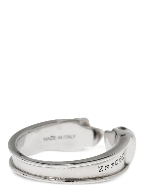 Anillo Alexander McQueen de acero inoxidable plateado