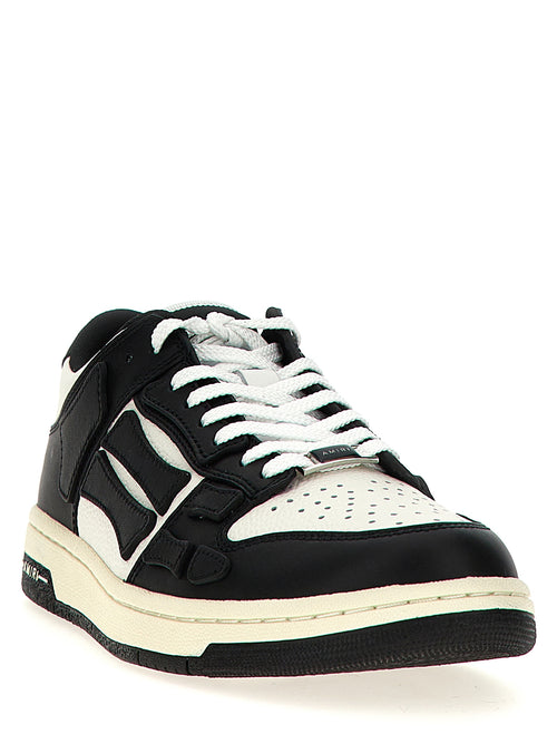Baskets basses Amiri Bicolor en peau de vache