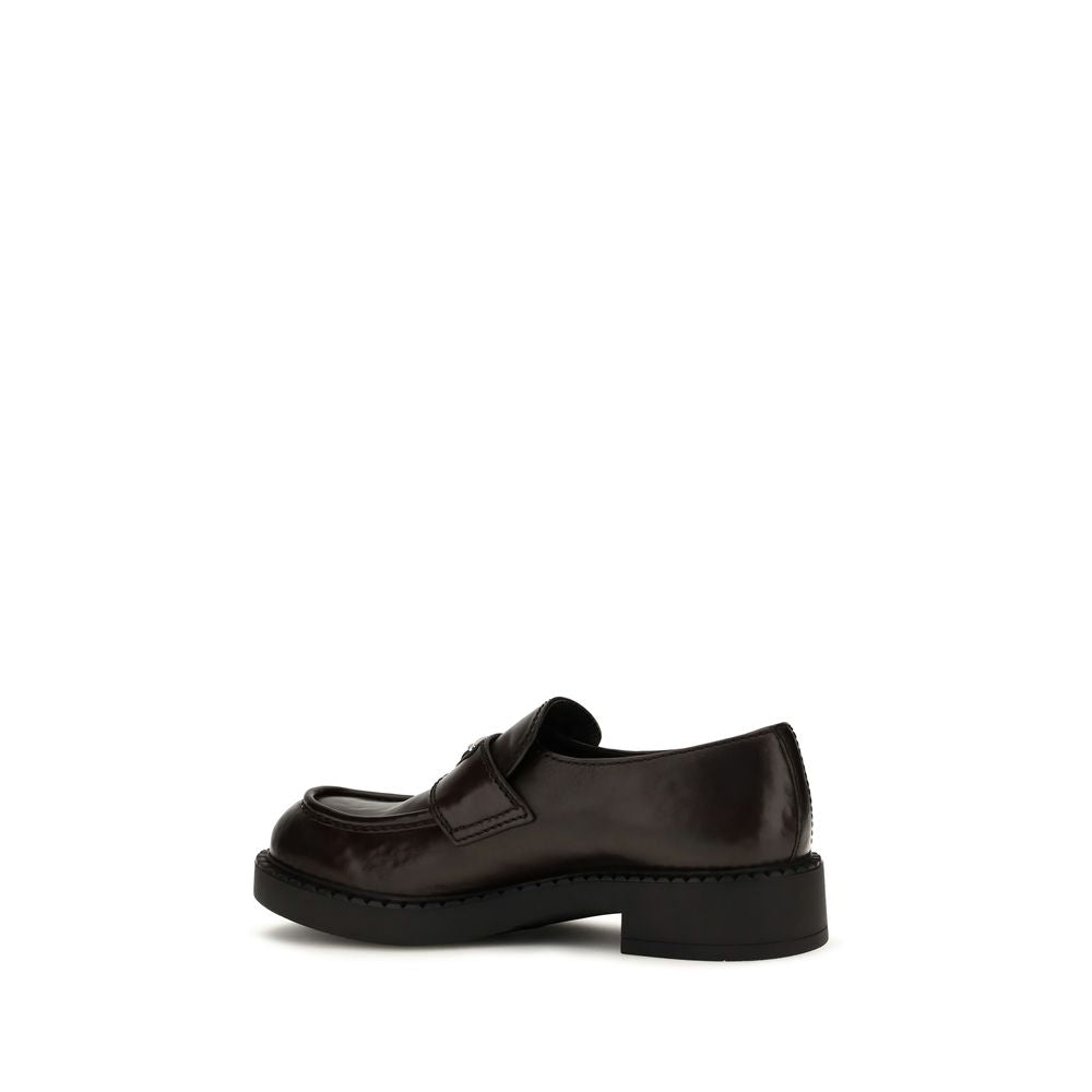 Mocasines slip-on de piel de becerro marrón Bos Taurus de Prada