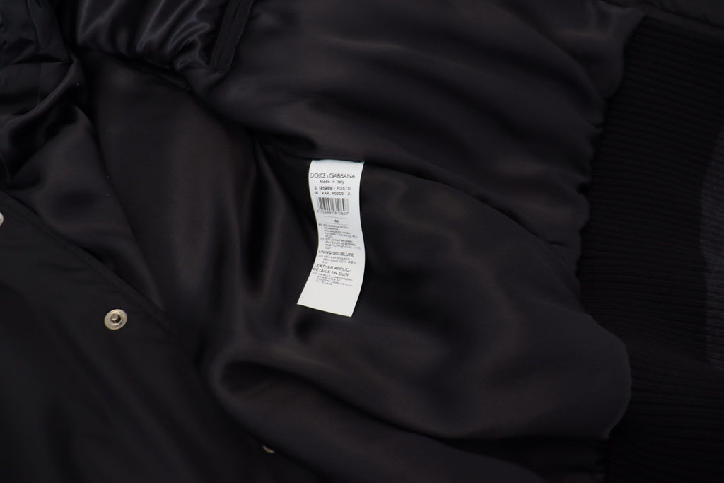 Chaqueta bomber de Dolce & Gabbana elegante, negra, con adornos de cristal