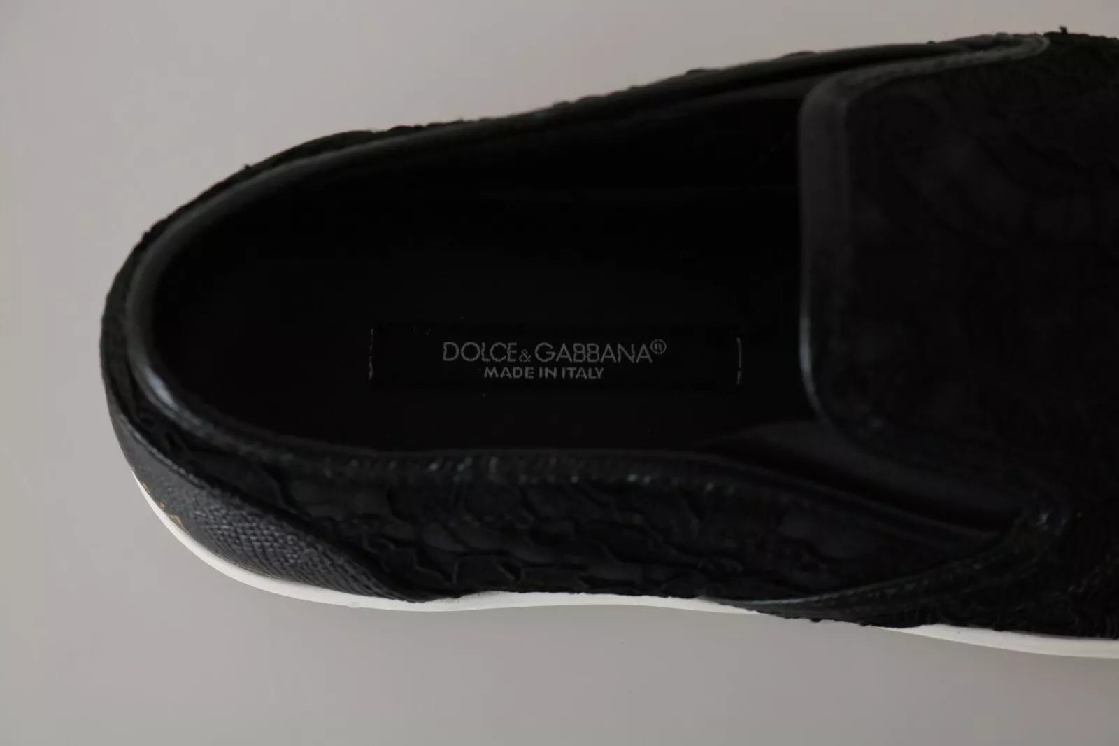 Zapatillas planas sin cordones de cuero negro con encaje y logo Dolce & Gabbana