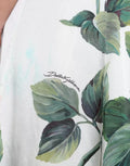 Dolce & Gabbana Falda midi acampanada de talle alto con estampado de rosas blancas
