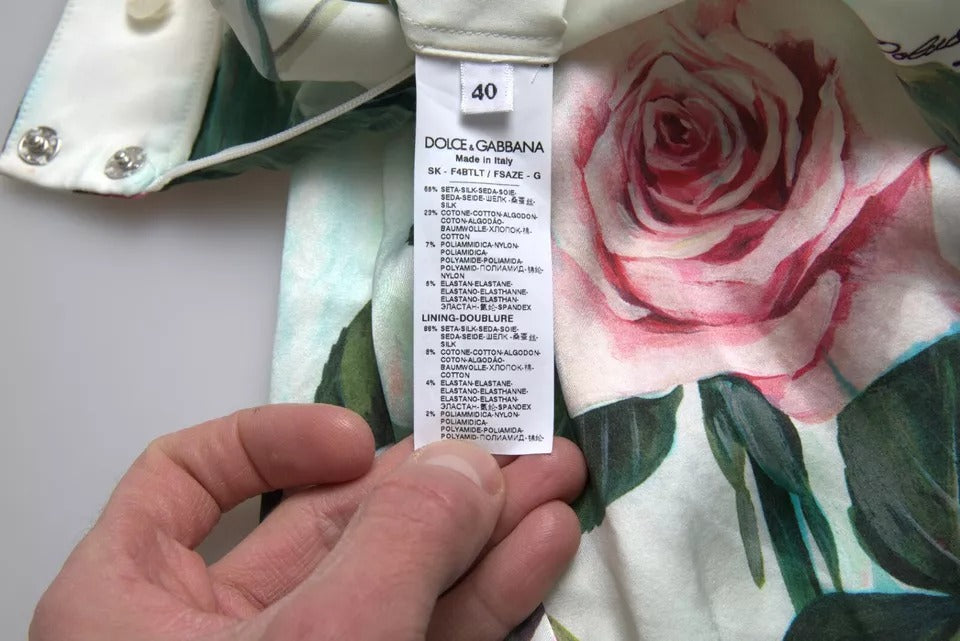 Dolce & Gabbana Falda midi acampanada de talle alto con estampado de rosas blancas