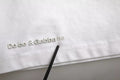 Camiseta Dolce & Gabbana de Algodón Blanca con Logo Repujado y Cuello Redondo