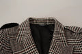 Chaqueta larga tipo gabardina a cuadros grises de Dolce & Gabbana
