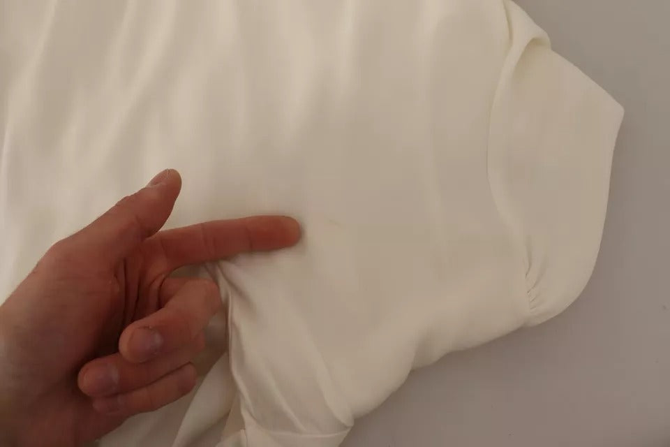 Top Dolce & Gabbana de cuello alto de seda blanco roto y manga larga