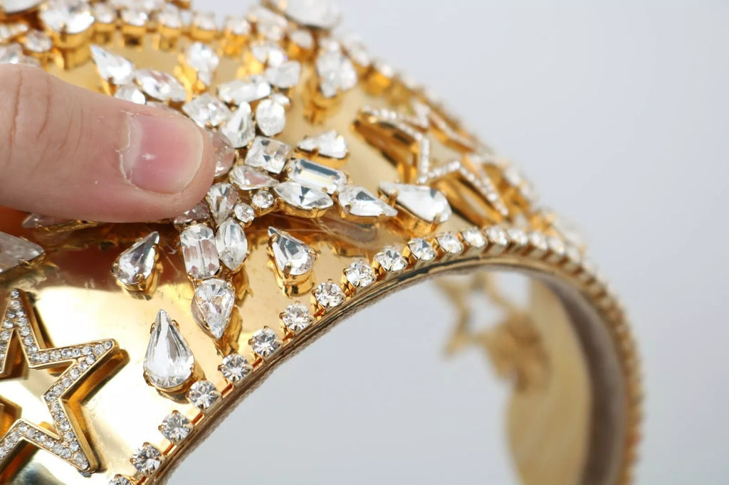 Diadema de cristal dorado con logotipo de corona y estrellas STRASS de Dolce & Gabbana