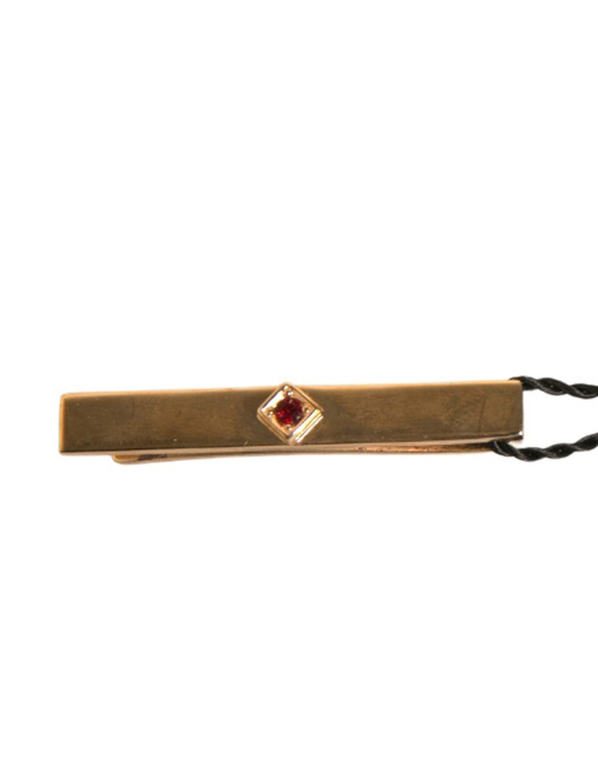 Barra de corbata de Dolce & Gabbana en latón tono dorado con cristales y logotipo