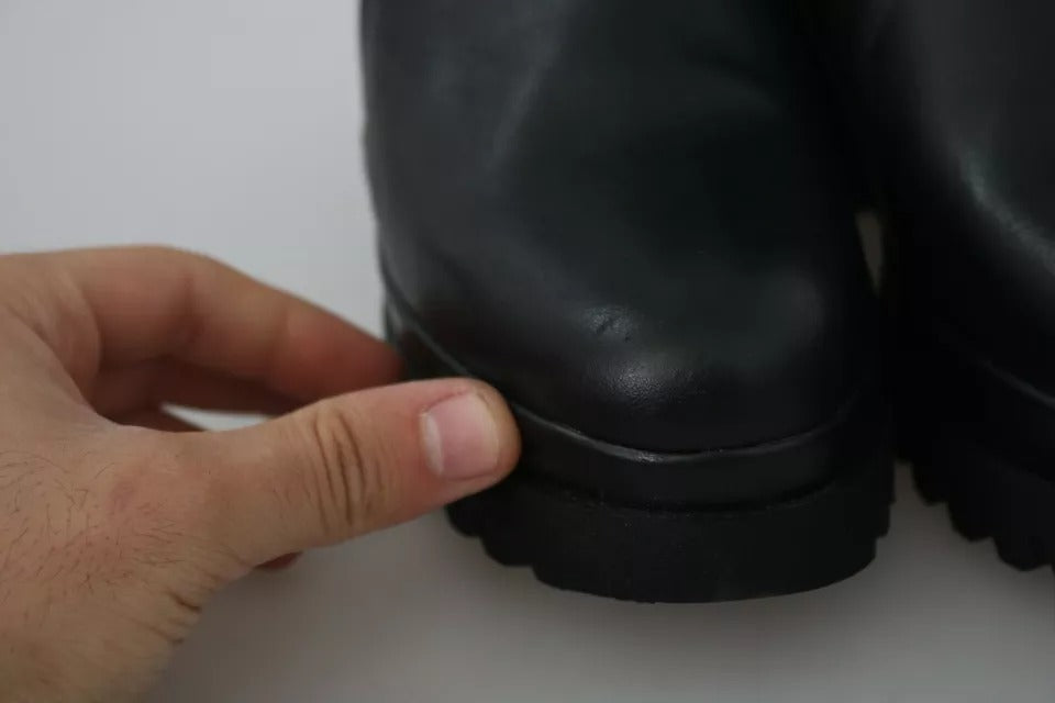 Botines Ovyé de piel negra con cremallera