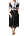 Vestido midi de seda y encaje macramé blanco y negro de Dolce & Gabbana